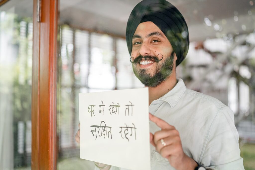 Indian man smiling, wearing turban