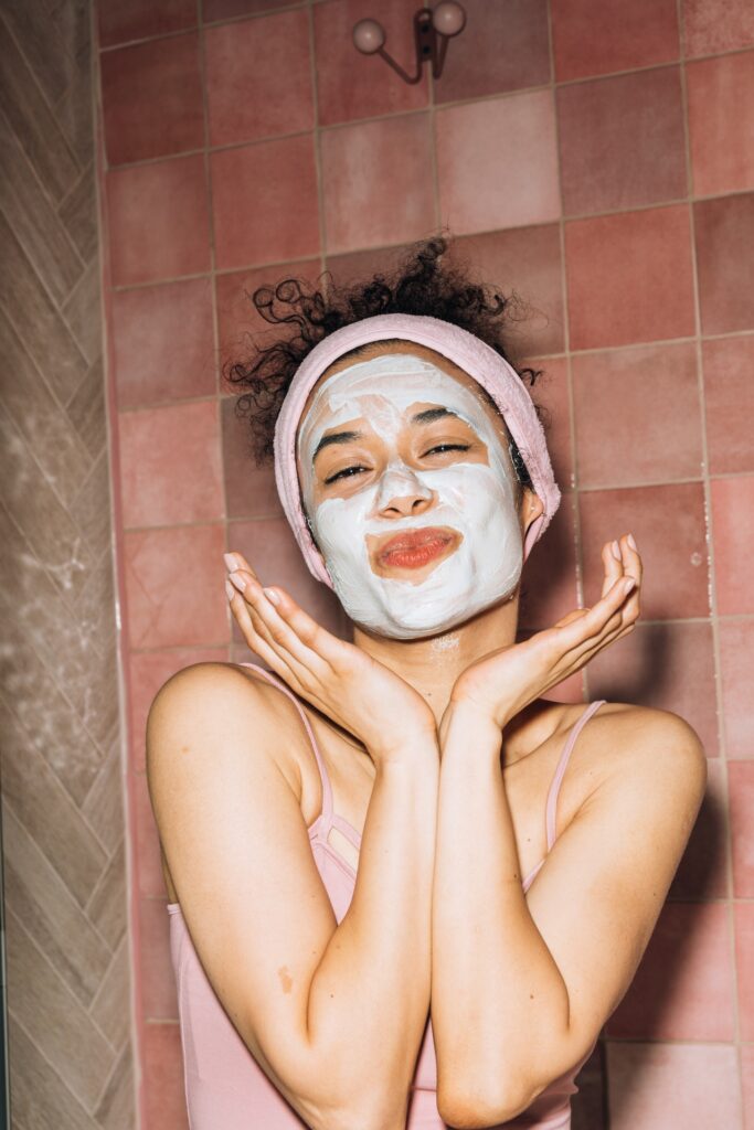 Girl with facial mask, happy